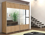 Szafa do sypialni z lustrami na froncie i kolorze w krafcie złotym Apollo 2-17 w aranżacji