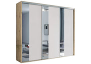 Szafa z białym frontem i korpusem w kolorze kraftu złotego