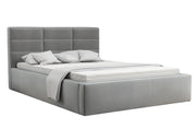 Szare łózko do salonu z metalową ramą