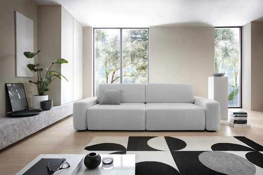 Jasnoszara rozkładana sofa Beonce z funkcją spania w aranżacji