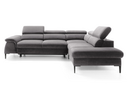 Szary narożnik do spania na metalowych nóżkach