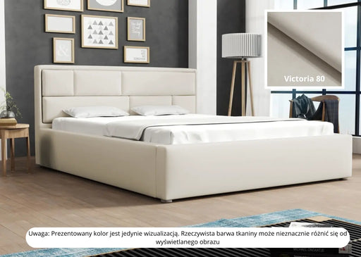Kremowe łóżko z pojemnikiem Decoria w sypialni z modną lampą