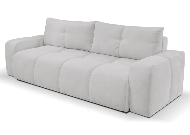 Jasno szara sofa z poduszkami i siedziskiem z pikami