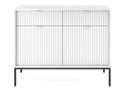 Biała komoda na czarnych nogach 