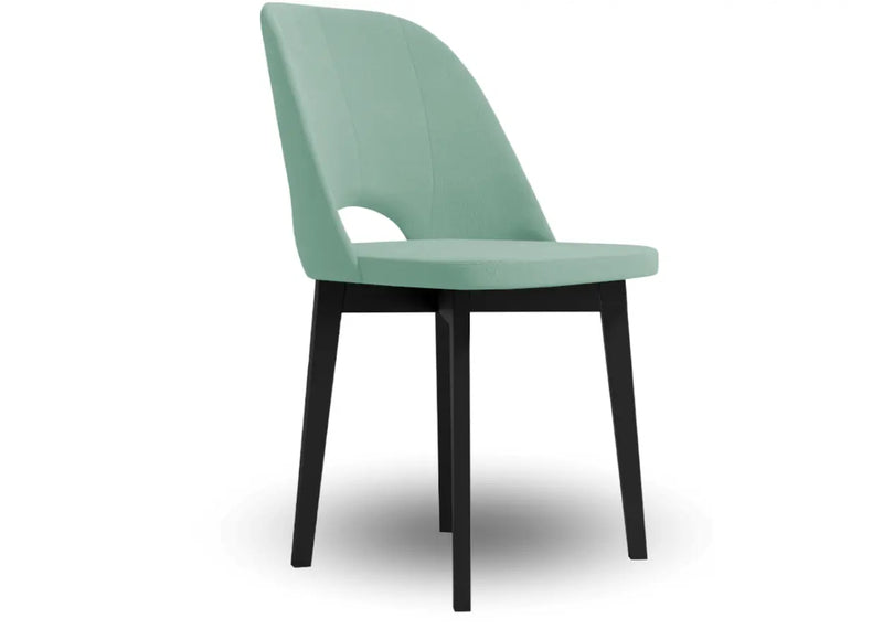Pistacjowe krzesło tapicerowane na czarnych nogach!