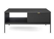 Czarny stolik kawowy na czarnych nogach i z ryflowanymi szufladami