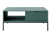 Zielony stolik kawowy z eleganckimi, czarnymi dodatkami