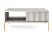 Szary stolik kawowy na złotych nóżkach i złotych uchwytach