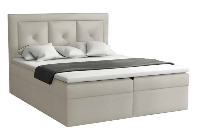 Kremowe łóżko z pikowanym wezgłowiem do sypialni