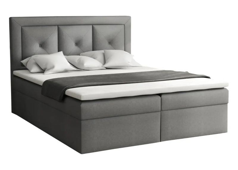 Ciemno szare łóżko z pikowanym wezgłowiem