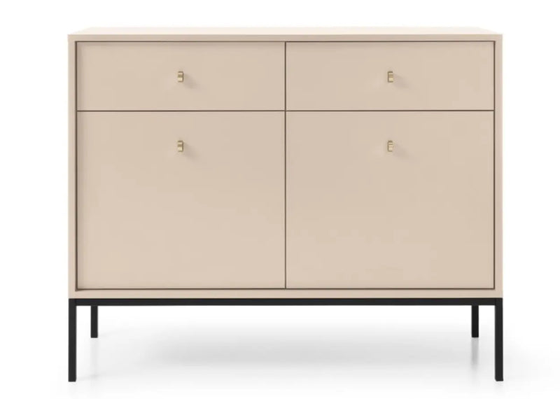 Mała komoda w kolorze beżowym ze złotymi uchwytami i czarnymi nogami