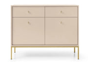 Mała komoda w kolorze beżowym ze złotymi uchwytami i złotymi nogami