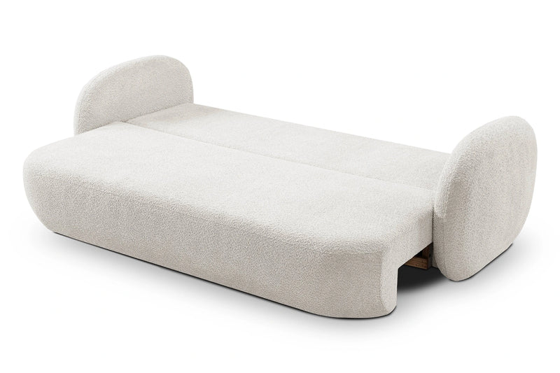 Rozłożona sofa z okrągłymi boczkami