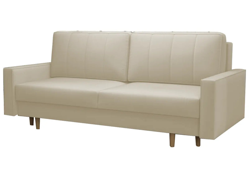 Kremowa sofa z poduszkami i możliwością rozłożenia