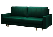 Zieleń butelkowa na sofie do salonu