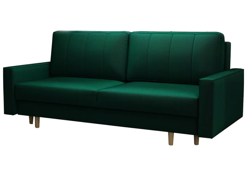 Zieleń butelkowa na sofie do salonu